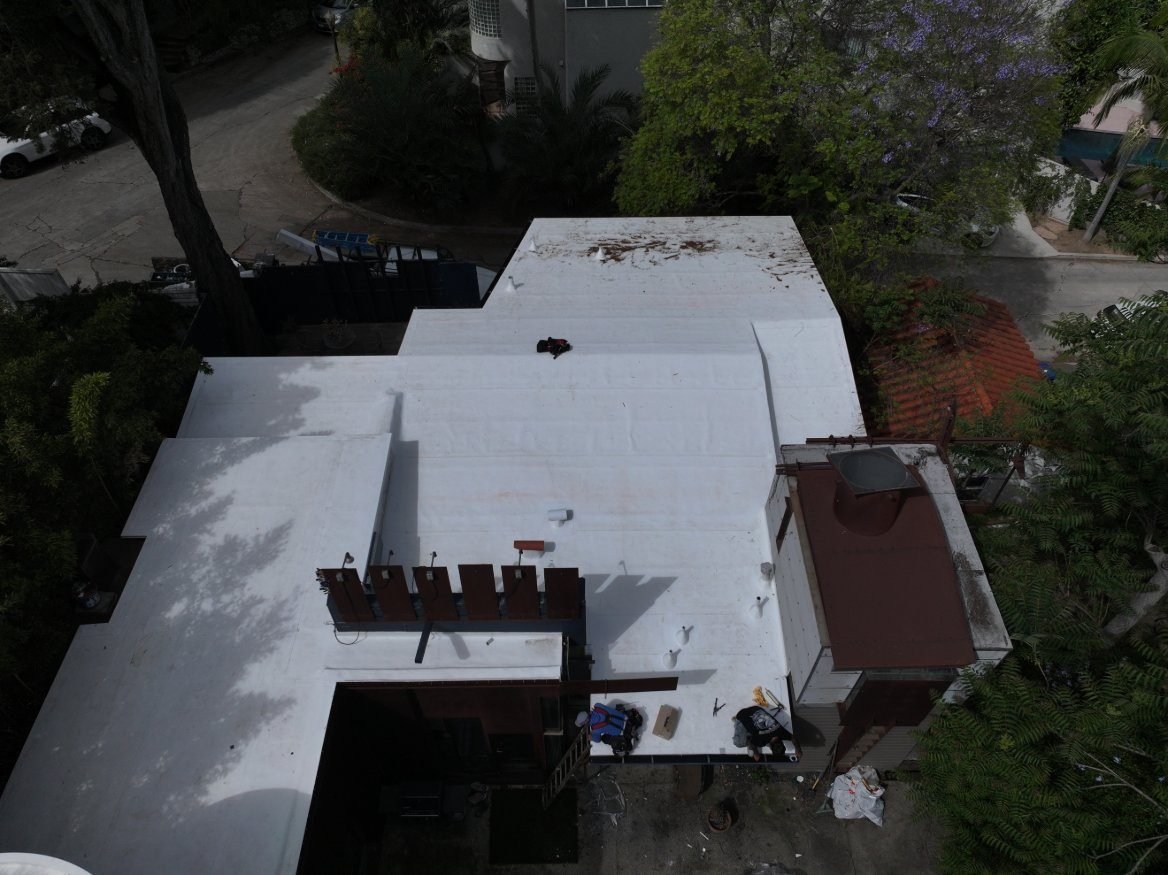 Completed white TPO roofing system on a Los Angeles home by Cal Green Roofing